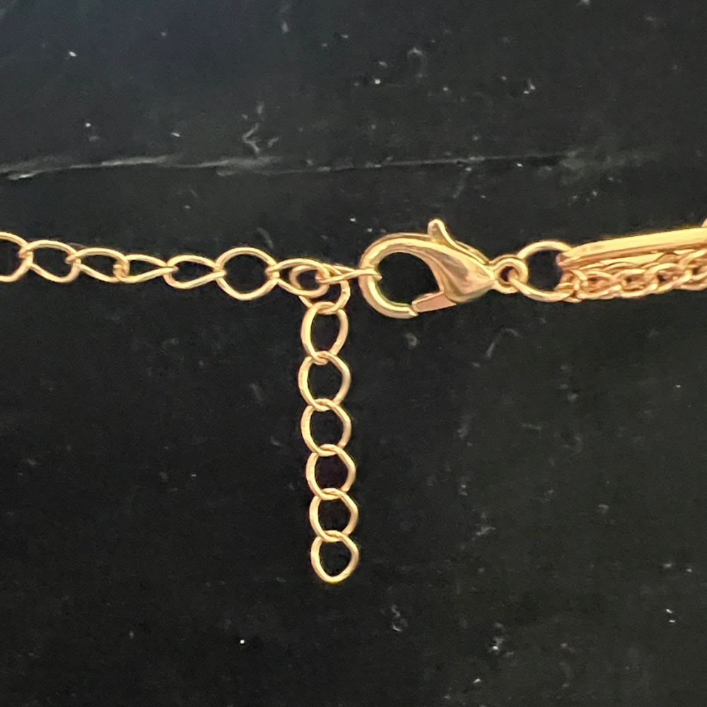 Gold-Tone Layered necklace with Queen Elizabeth coin and charms. - Picture 4 of 4